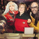 A trio of DragonCon 2001 attendees, one of whom, significantly, is a woman.